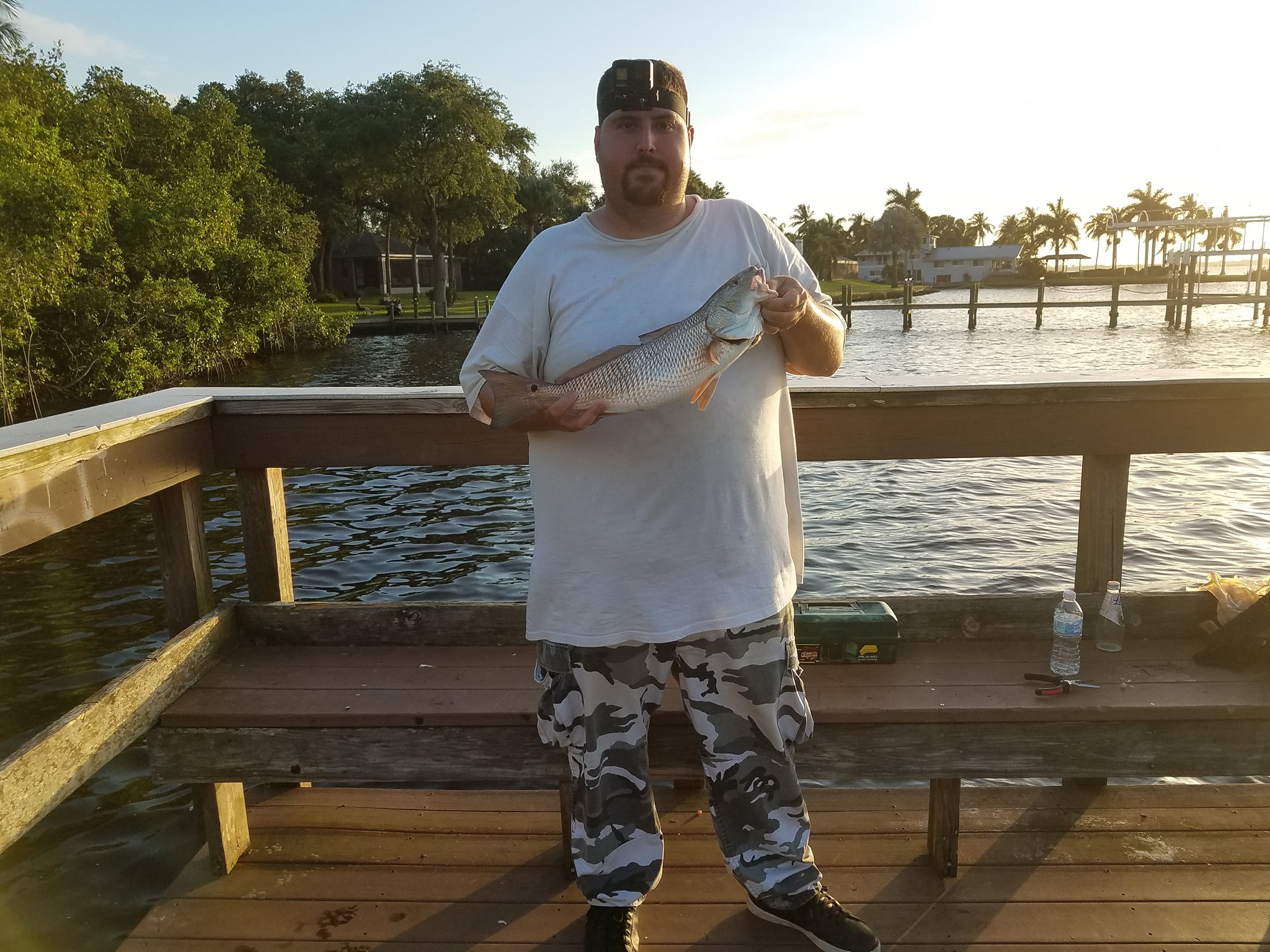 Holding a small Redfish
